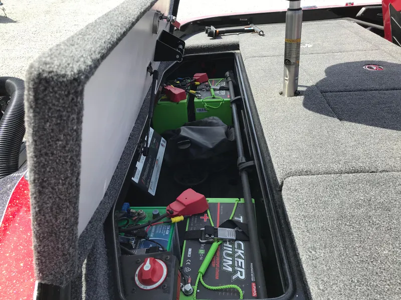 Slide: The Image of 2023 Ranger Z520R boat battery compartment with lithium batteries and wiring. - 16