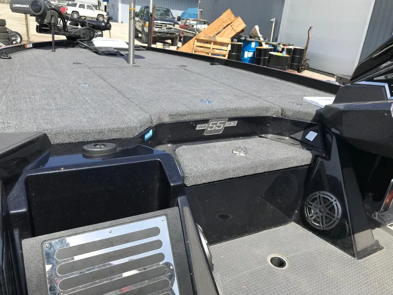 Slide: The Image of 2023 Ranger Z520R Ranger Cup Equipped boat interior with carpeted deck and storage compartments. - 25