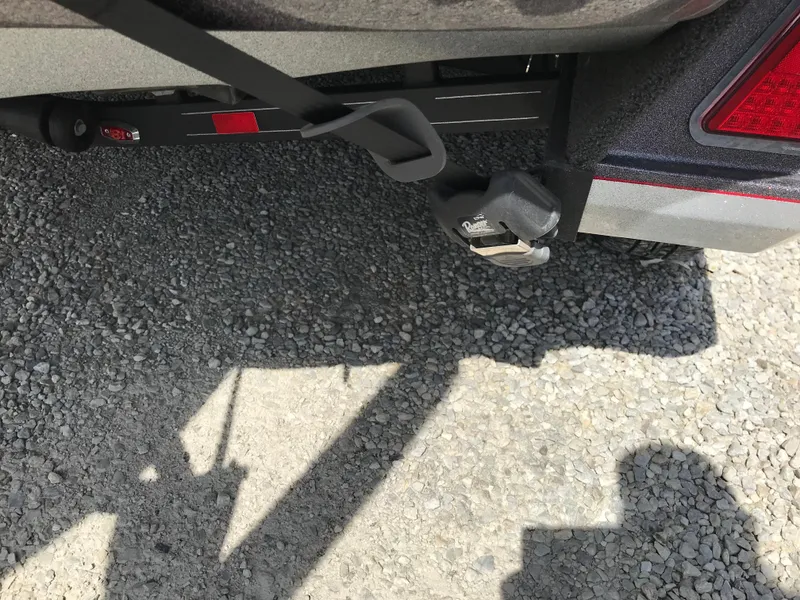 Slide: The Image of 2023 Ranger Z520R Ranger Cup Equipped trailer hitch on gravel surface. - 34