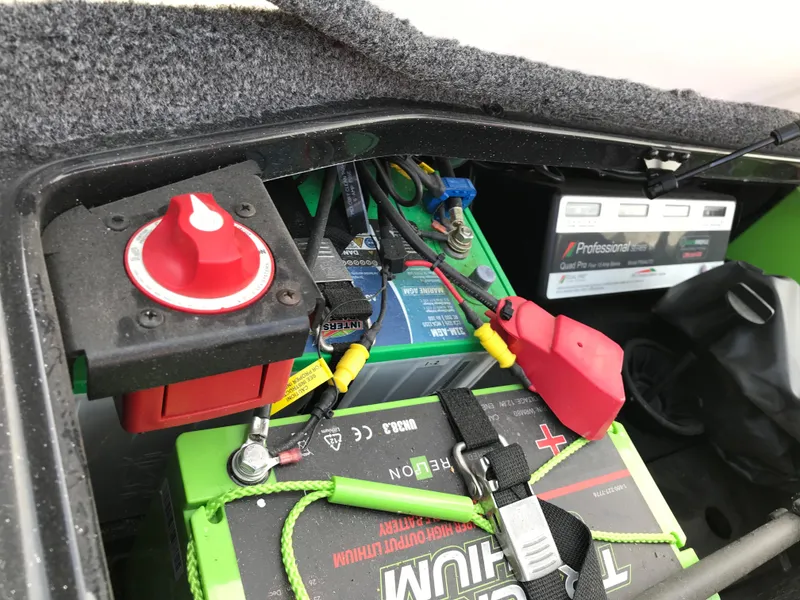 Slide: The Image of 2023 Ranger Z520R Ranger Cup Equipped boat battery compartment with wiring and switch. - 36