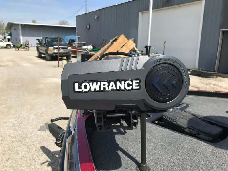 Slide: The Image of 2023 Ranger Z520R boat with Lowrance equipment in a parking area. - 4