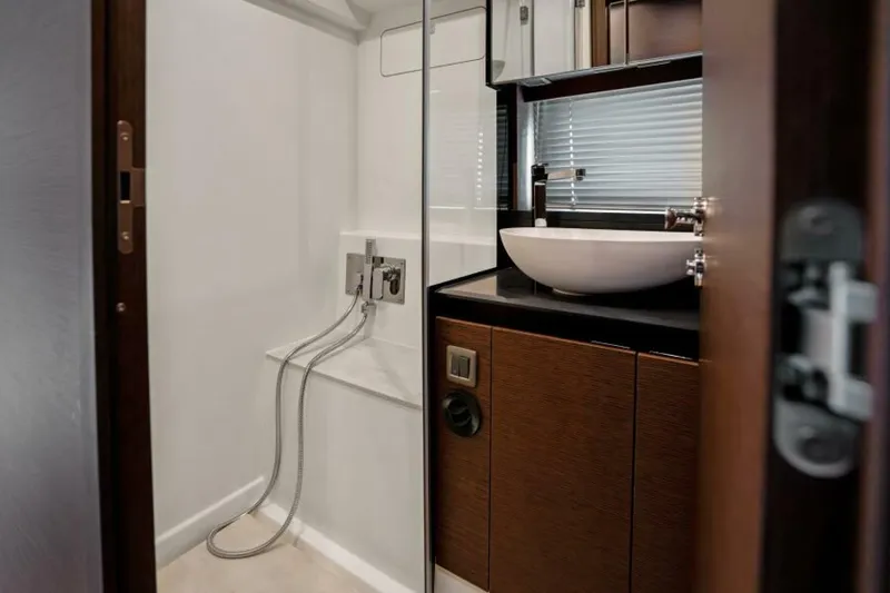 Slide: The Image of 2024 46 Prestige Flybridge -Master Stateroom Head - 24