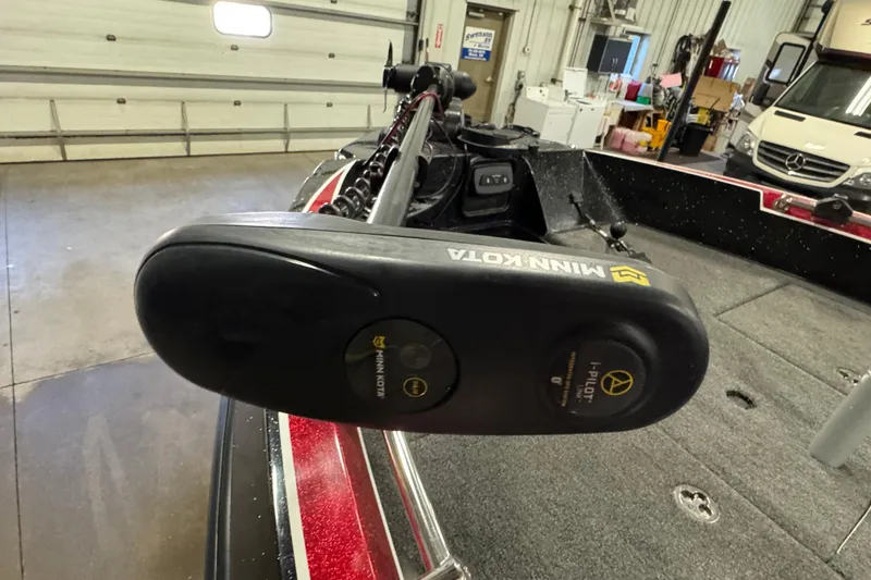 Slide: The Image of Minn Kota motor on 2022 Nitro ZV20 boat in a garage setting. - 16
