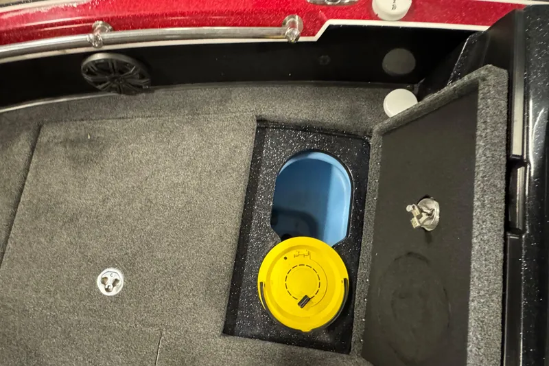 Slide: The Image of 2022 Nitro ZV20 boat interior with storage compartment and speaker. - 17