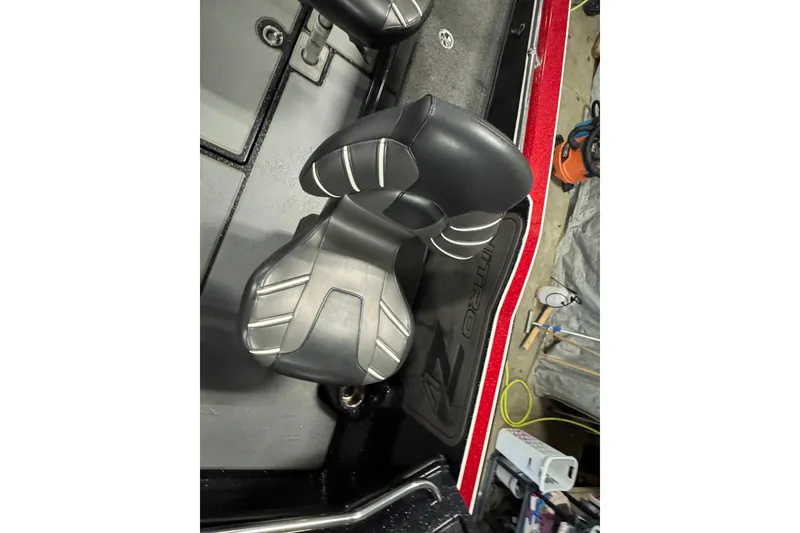 Slide: The Image of 2022 Nitro ZV20 boat seat with sleek black and gray design. - 8