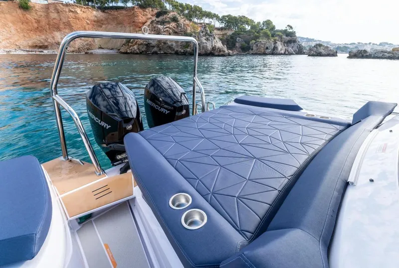 Slide: The Image of 2026 Axopar 29 XC Cross Cabin interior with cozy seating and modern design. - 6