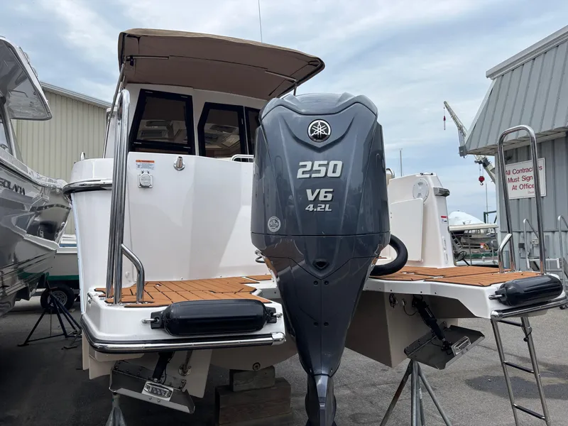 Slide: The Image of 2025 Ranger Tugs R-25 boat with Yamaha 250 V6 outboard motor. - 3