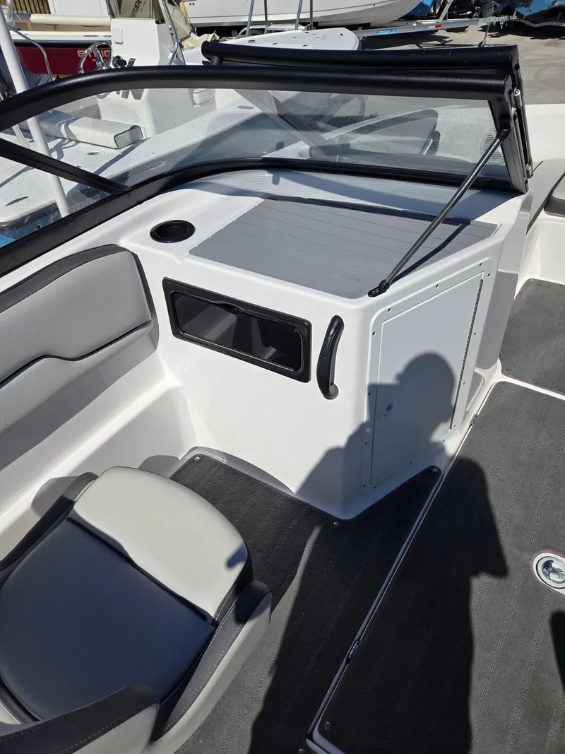 Slide: The Image of 2022 Yamaha Boats SX190 interior with seating and dashboard details. - 16