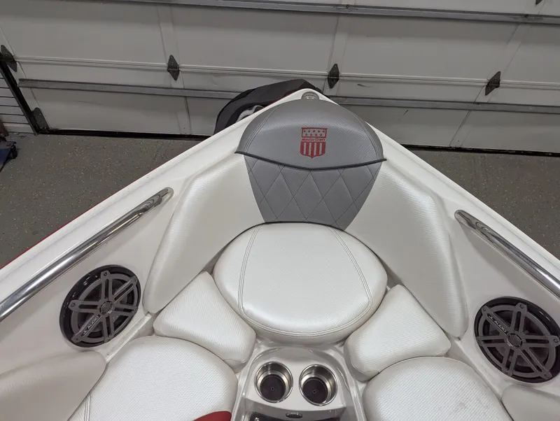 Slide: The Image of Interior view of 2012 MasterCraft X-14 boat with white seating and cup holders. - 14