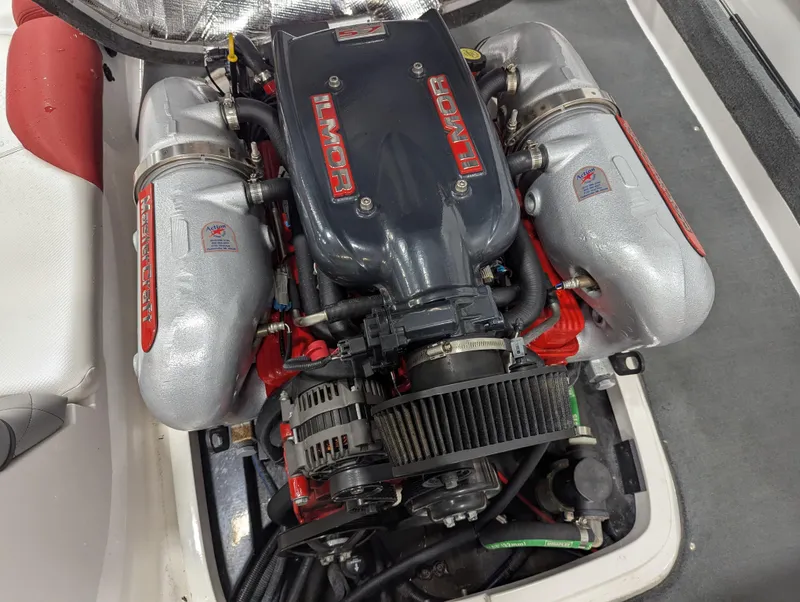 Slide: The Image of 2012 MasterCraft X-14 engine with Ilmor branding, showcasing powerful marine performance. - 19