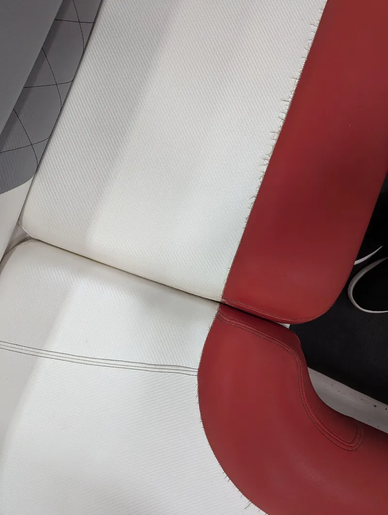 Slide: The Image of 2012 MasterCraft X-14 boat interior with red and white upholstery. - 24