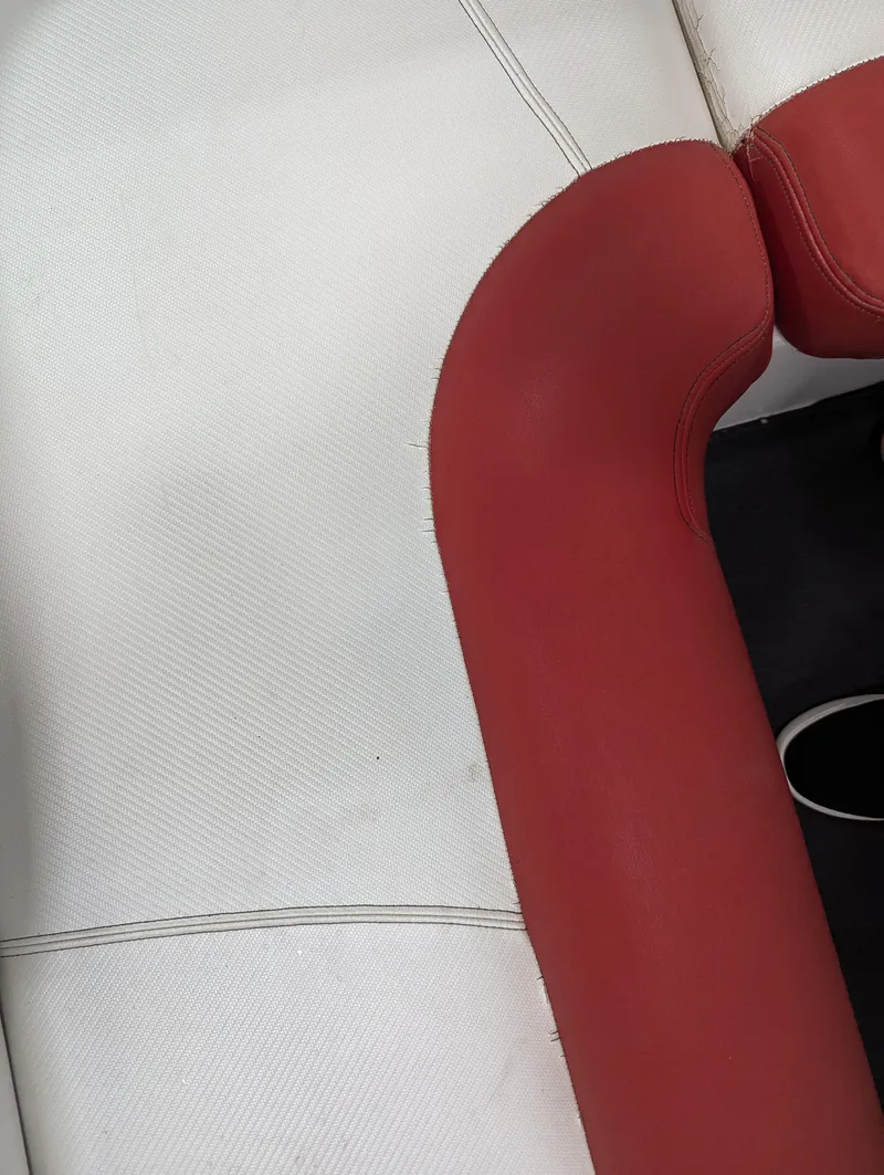 Slide: The Image of 2012 MasterCraft X-14 boat interior with red and white upholstery. - 25