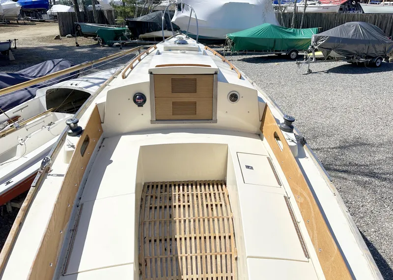 Slide: The Image of 1968 Allied Greenwich 24 sailboat deck view in a boatyard. - 10