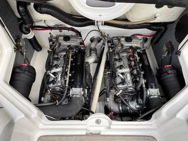 Slide: The Image of 2012 Yamaha AR210 boat engine compartment with dual engines, detailed view. - 33
