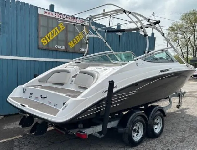 Slide: The Image of 2012 Yamaha AR210 boat on trailer at Sizzle Marine dealership. - 4