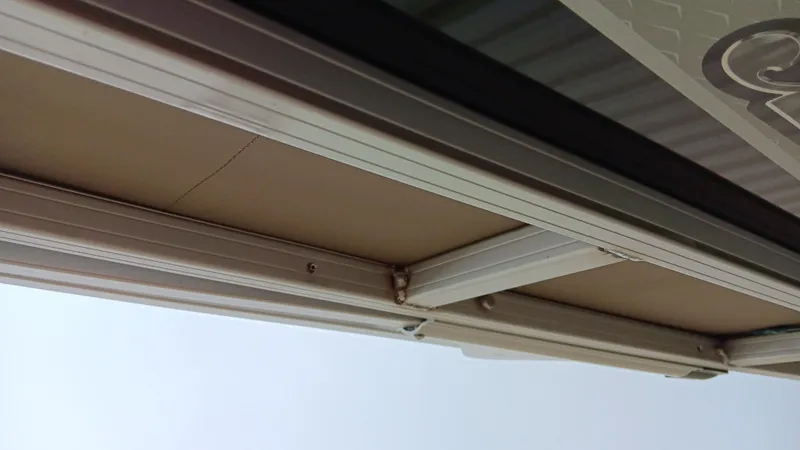 Slide: The Image of Aluminum frame structure of a Ranger 200F, 2022 model, viewed from below. - 16