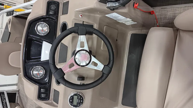 Slide: The Image of Steering console of 2022 Ranger 200F boat with gauges and controls. - 9