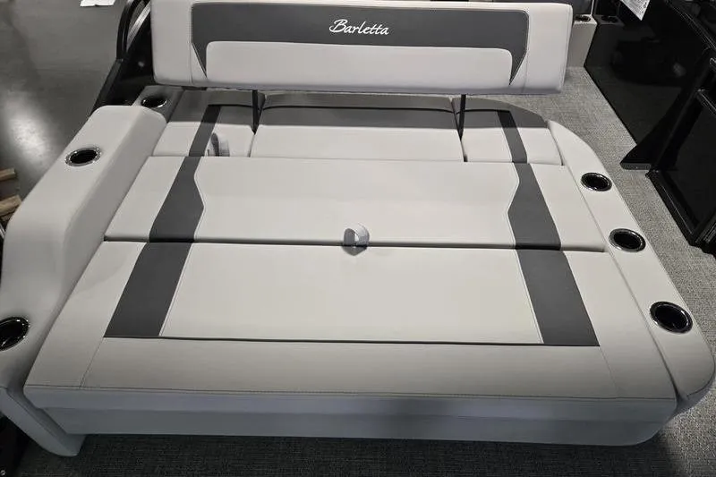 Slide: The Image of 2025 Barletta A22UC boat seating with cup holders and sleek design. - 10