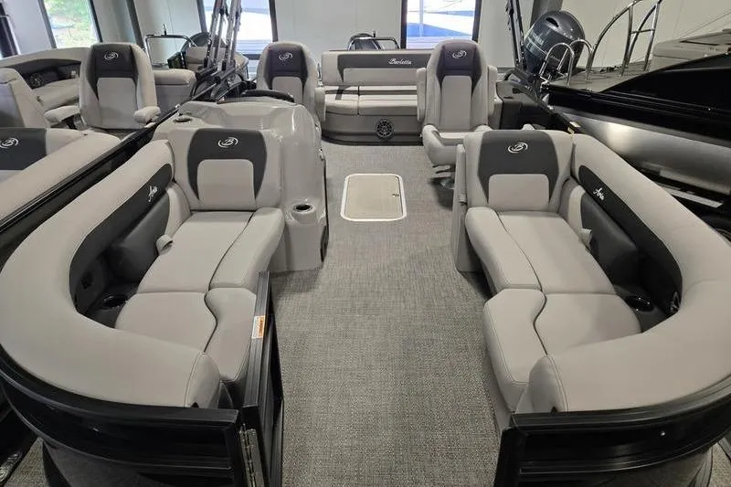 Slide: The Image of 2025 Barletta A22UC pontoon boat interior with luxurious seating and modern design. - 14