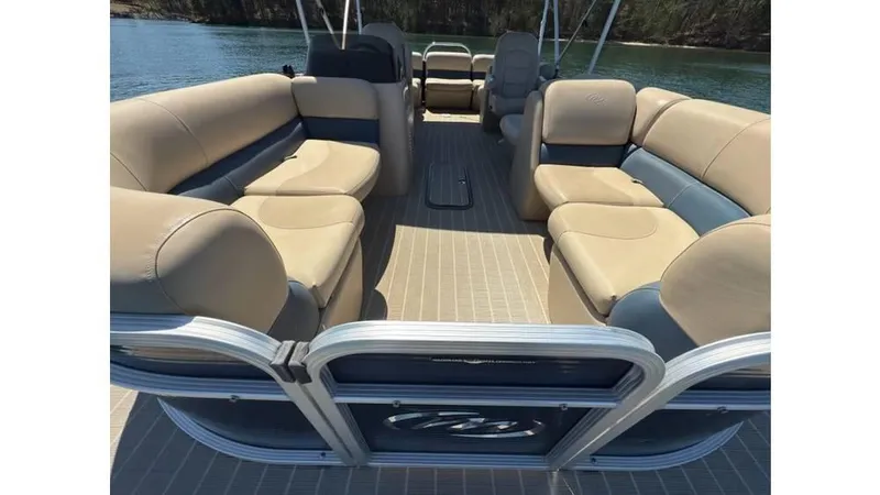 Slide: The Image of 2019 Manitou 23 Aurora LE Bar pontoon boat with spacious seating and elegant design. - 11
