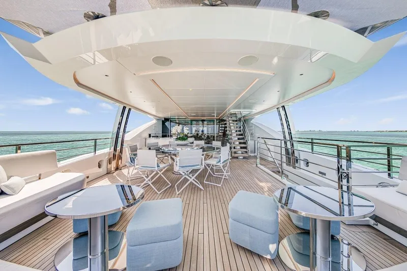 Slide: The Image of Luxurious 2020 Rossinavi Custom yacht deck with modern seating and ocean view. - 17