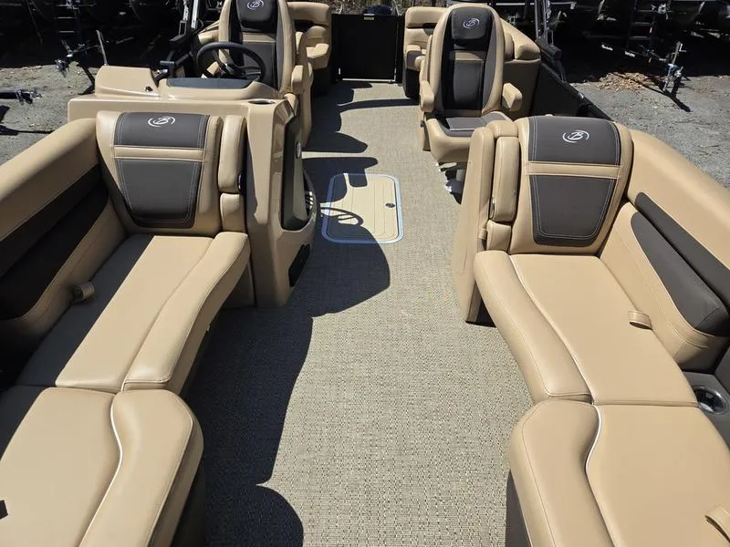 Slide: The Image of 2025 Barletta C22QC pontoon boat interior with beige seating and modern design. - 18