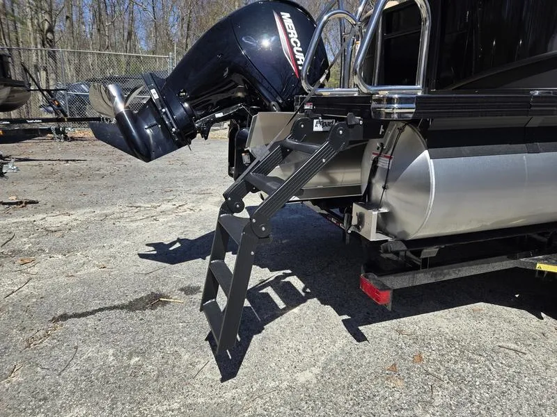 Slide: The Image of 2025 Barletta C22QC boat with Mercury outboard motor and foldable ladder. - 19