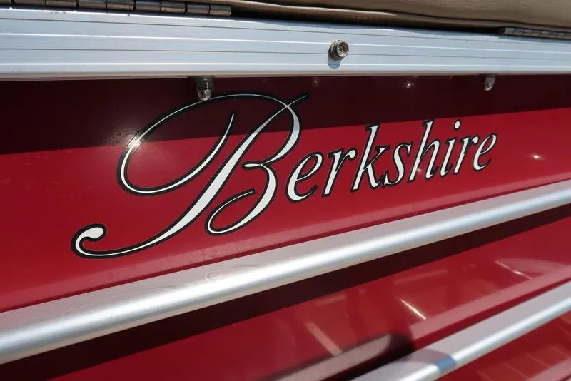 Slide: The Image of Red Berkshire G210CL boat, 2012 model, with elegant script logo. - 14