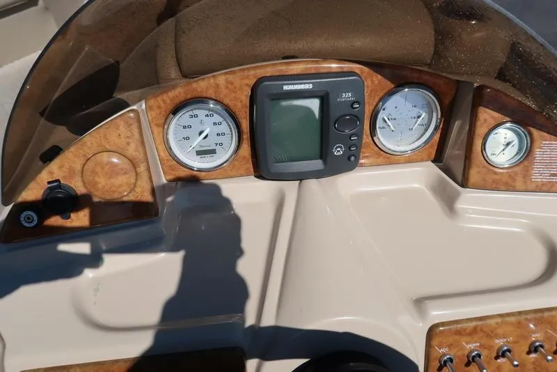Slide: The Image of Dashboard of 2012 Berkshire G210CL boat with gauges and a central display. - 24
