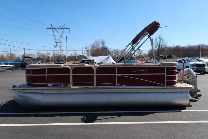 Slide: The Image of 2012 Berkshire G210CL pontoon boat in parking lot, side view, sunny day. - 7