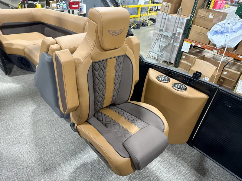 Slide: The Image of Luxurious seating on 2025 Bennington M Quad Bench 24 MFB with cup holders and elegant design. - 10