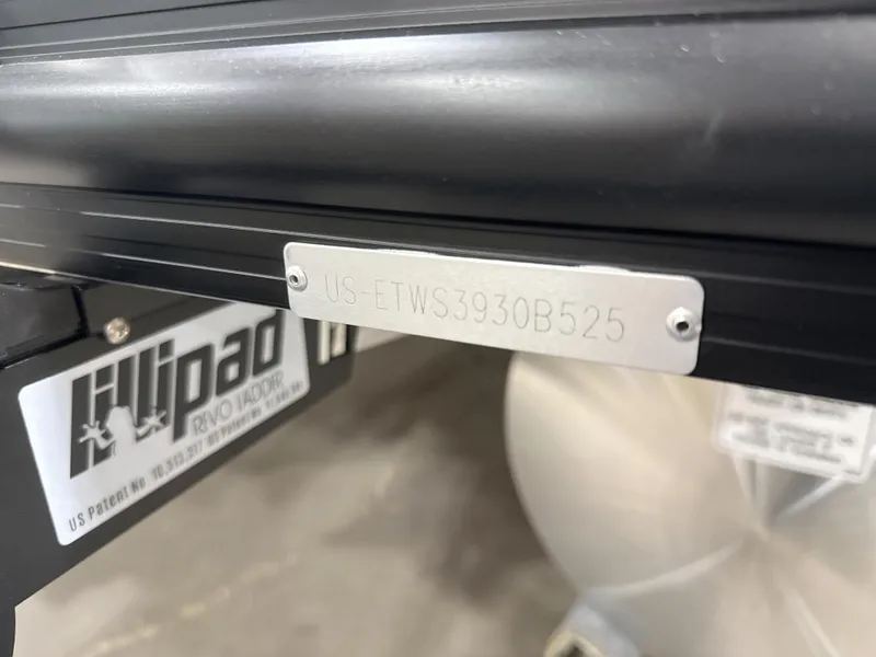 Slide: The Image of Bennington M Quad Bench 24 MFB 2025 with serial number plate and Lillipad branding. - 11