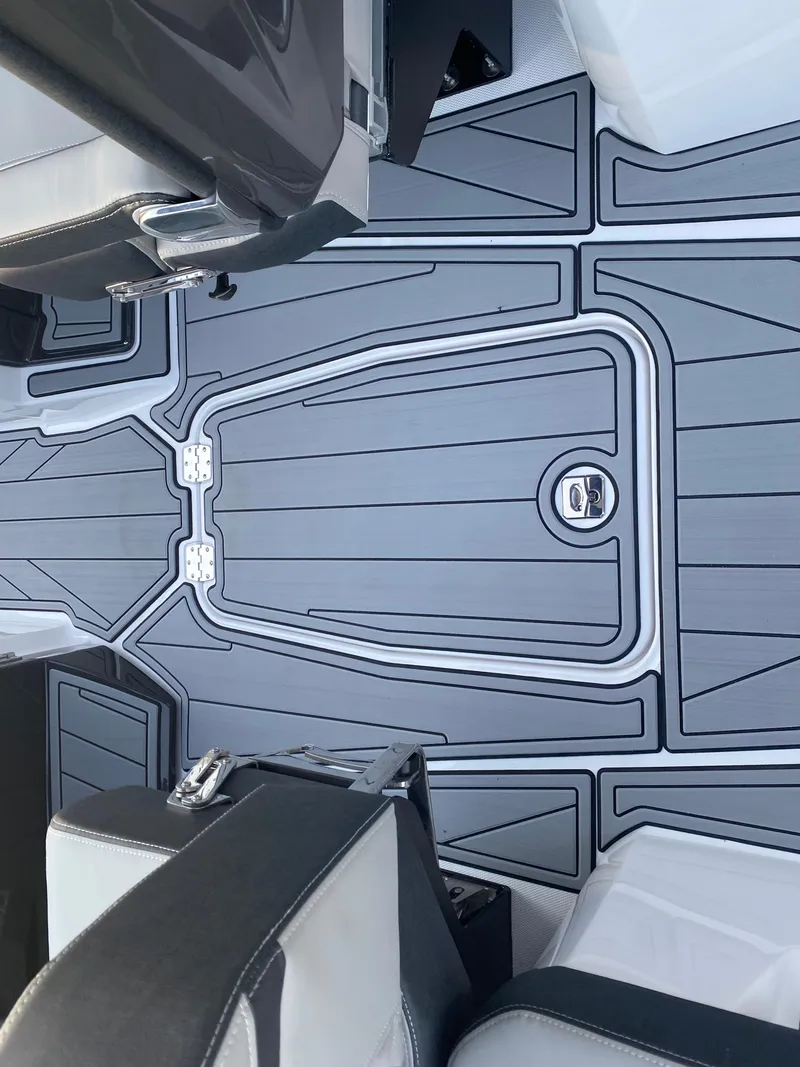 Slide: The Image of 2025 Monterey 278 Super Sport boat interior with sleek, modern flooring design. - 18