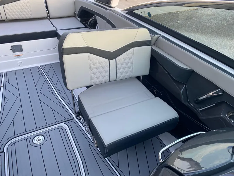 Slide: The Image of 2025 Monterey 278 Super Sport boat interior with stylish seating and modern design. - 23