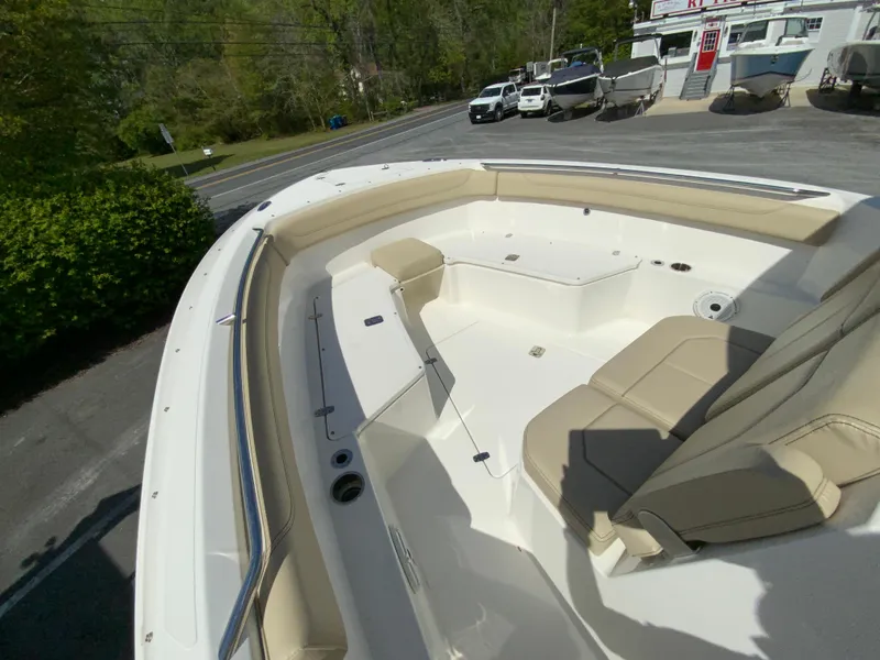 Slide: The Image of 2020 Pursuit S 288 Sport boat with spacious seating and sleek design. - 19