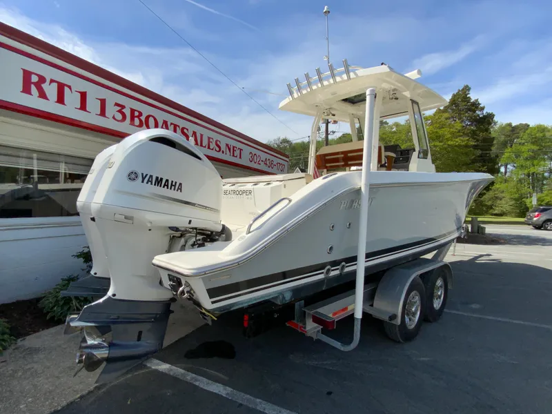 Slide: The Image of 2020 Pursuit S 288 Sport boat with Yamaha engine on trailer at dealership. - 8