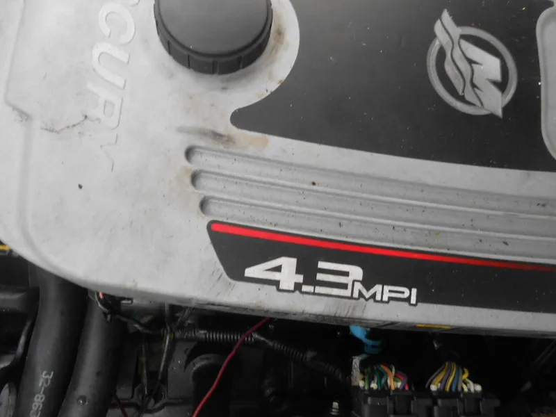 Slide: The Image of Engine of 2008 Sea Ray 280 Sundancer, featuring 4.3 MPI Mercury motor. - 19
