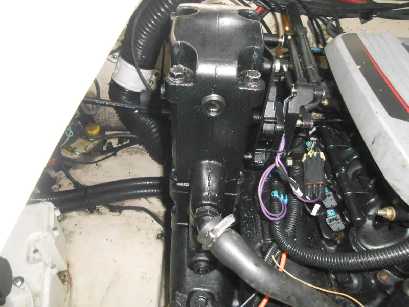Slide: The Image of Engine compartment of a 2008 Sea Ray 280 Sundancer boat, showing detailed components and wiring. - 20