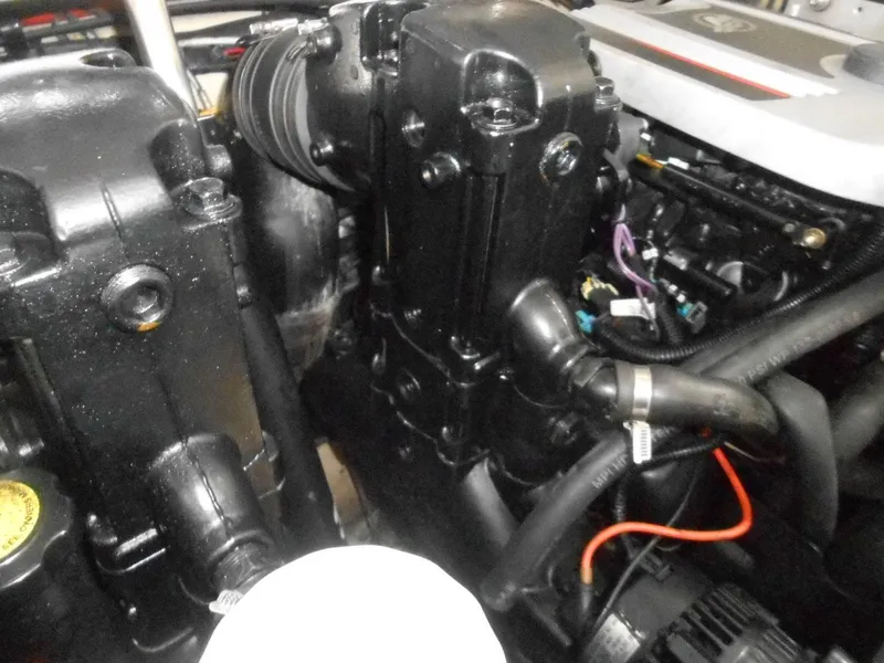 Slide: The Image of Engine components of a 2008 Sea Ray 280 Sundancer boat. - 21
