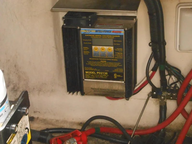 Slide: The Image of Battery charger in a 2008 Sea Ray 280 Sundancer boat engine compartment. - 22