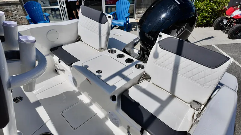 Slide: The Image of 2025 Bayliner Trophy 20 boat interior with seating and cup holders. - 5