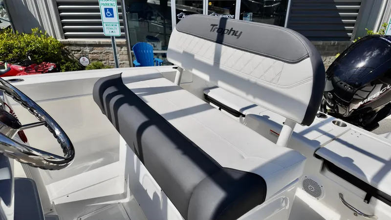 Slide: The Image of 2025 Bayliner Trophy 20 boat interior with steering wheel and seating. - 6
