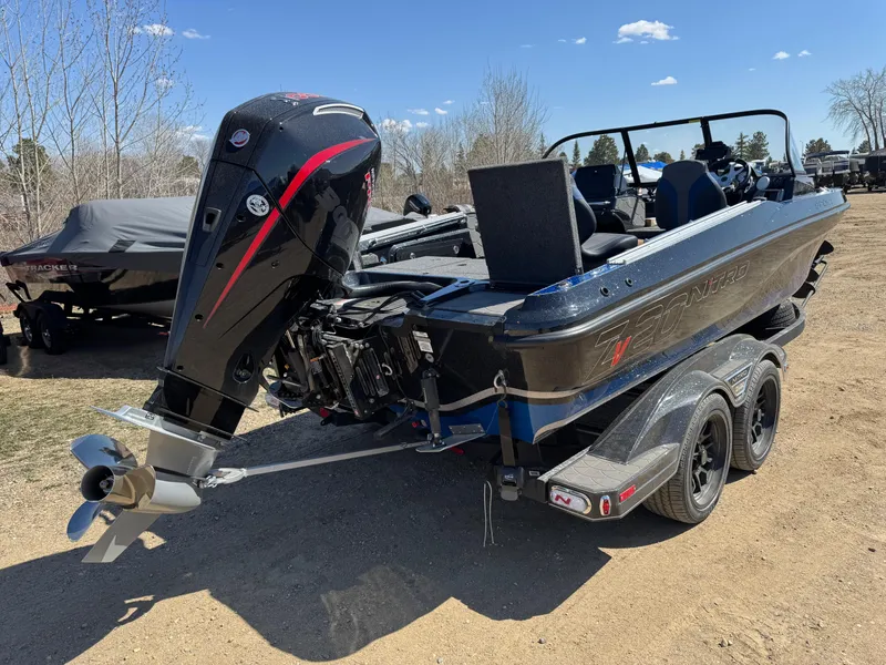 Slide: The Image of 2025 Nitro ZV20 Sport Pro boat on trailer, featuring powerful outboard motor. - 3