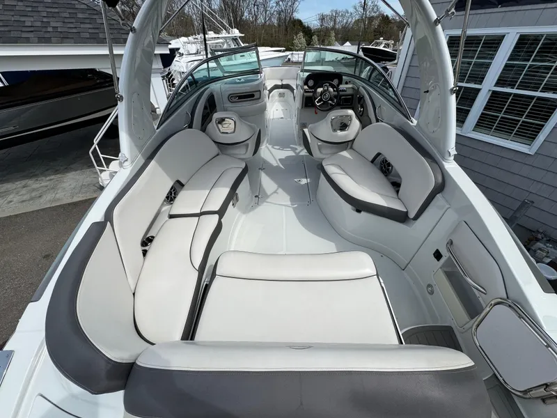 Slide: The Image of 2019 Crownline 290 XSS boat interior with spacious seating and modern design. - 12