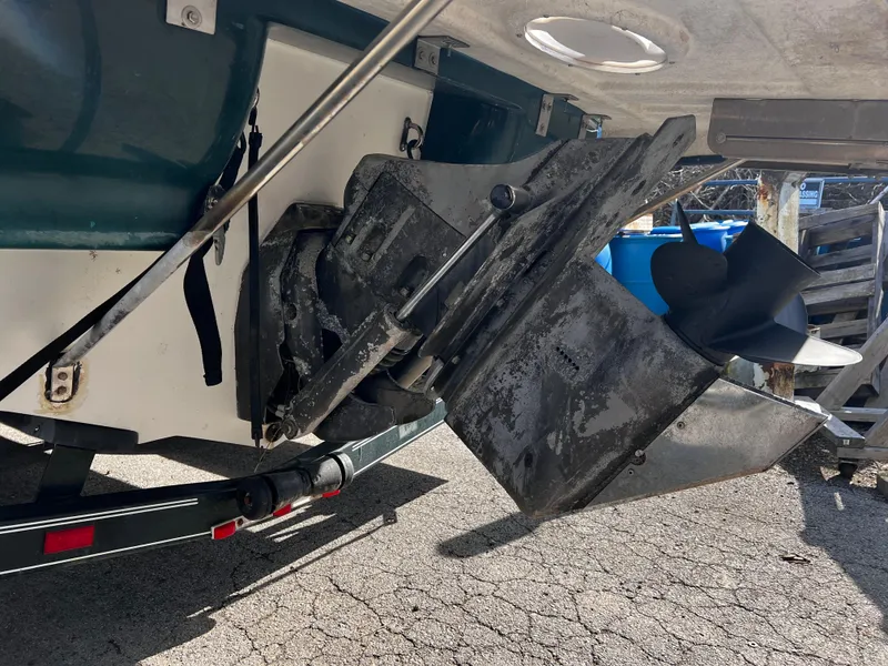 Slide: The Image of 2001 Glastron GS 229 boat stern drive and propeller on a trailer. - 12