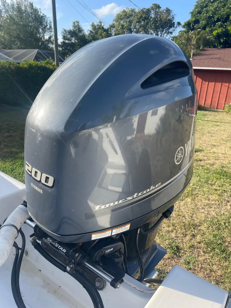 Slide: The Image of Yamaha 200 four-stroke outboard motor on 2022 Tidewater Adventure boat. - 28