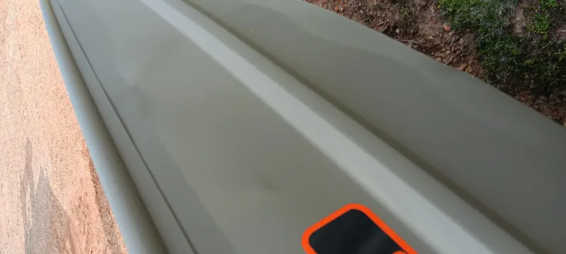 Slide: The Image of 2024 Tracker Grizzly 1036 Jon boat, top view, showing sleek design and durable construction. - 11