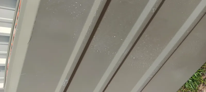 Slide: The Image of 2024 Tracker Grizzly 1036 Jon boat hull, close-up view of metal surface. - 3