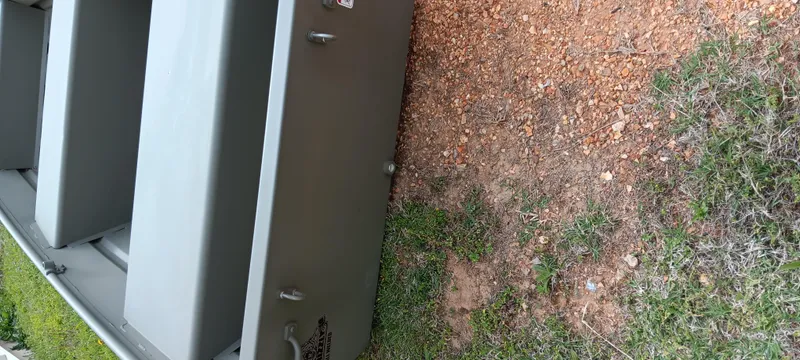 Slide: The Image of 2024 Tracker Grizzly 1036 Jon boat on grass and dirt surface. - 6