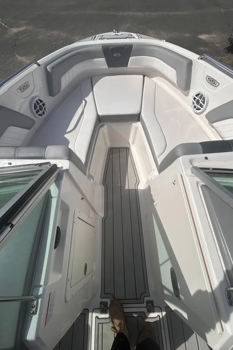 Slide: The Image of 2021 Chaparral SSI boat interior with sleek seating and modern design. - 4